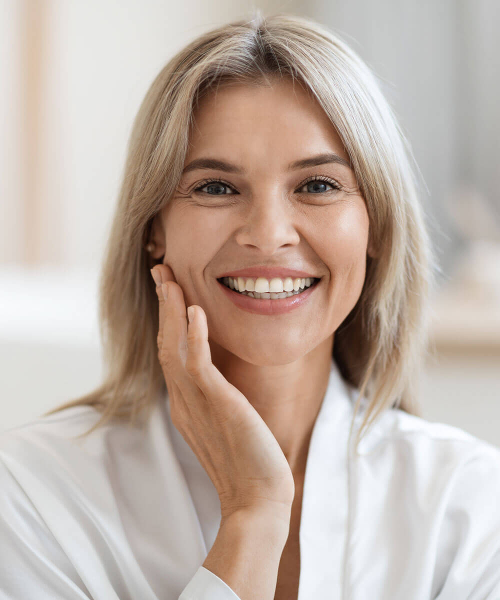 blond woman wearing a white robe